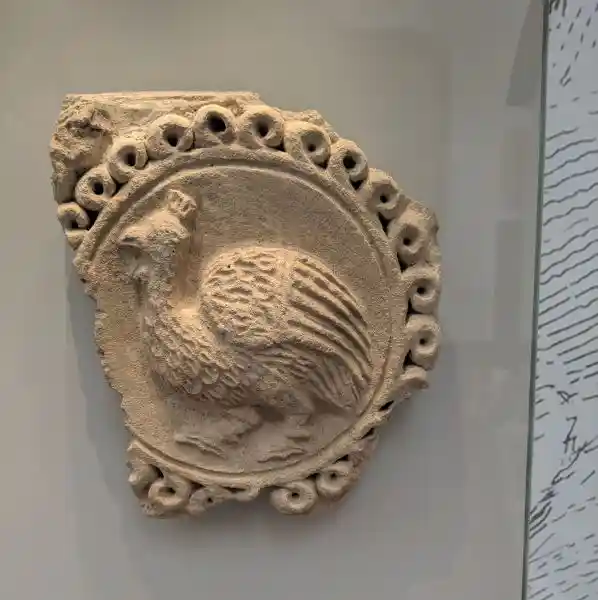 One of the Sasanian stucco art collections, bird inside a solar disc, located at the Pergamon museum.